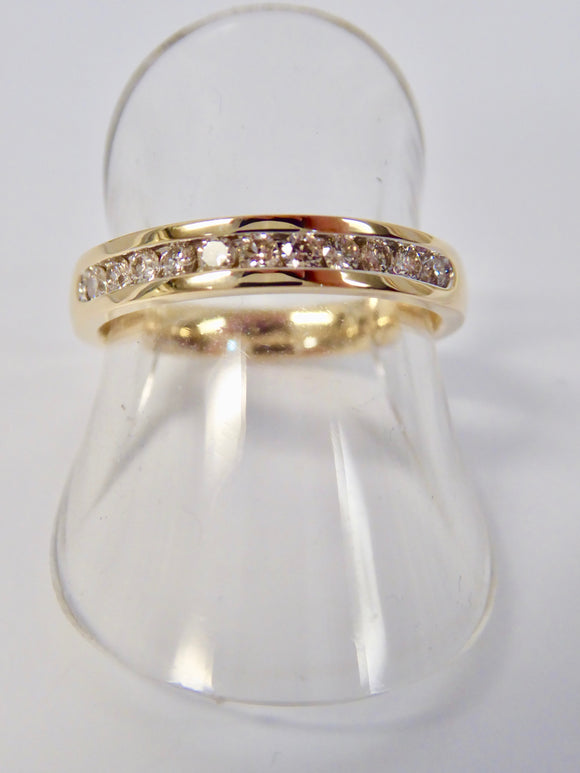 9CT GOLD & DIAMOND CHANNEL SET HALF ETERNITY RING