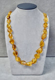 AMBER SMALL CLEAR NUGGET BEAD NECKLACE 20"