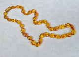 AMBER SMALL OVAL GRADUATED BEAD NECKLACE 20"