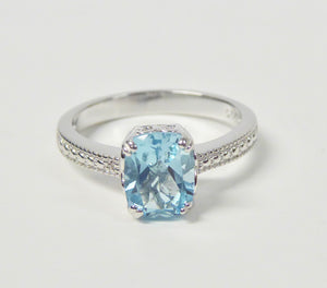 STERLING SILVER BLUE TOPAZ & DIAMOND OBLONG RING