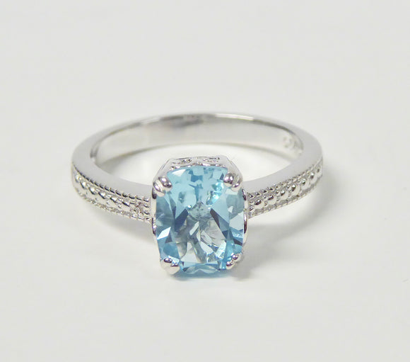 STERLING SILVER BLUE TOPAZ & DIAMOND OBLONG RING