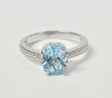 STERLING SILVER BLUE TOPAZ & DIAMOND OBLONG RING